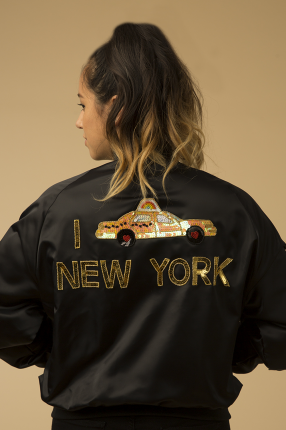 Bow & Drape Bomber Jacket: Perfect for any girl who loves NYC. Costs $128. 